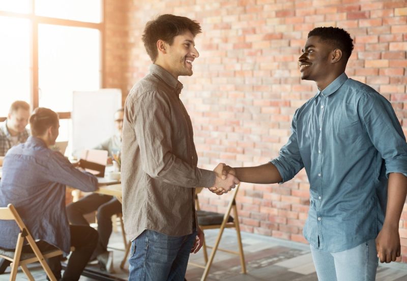 2 men shaking hands